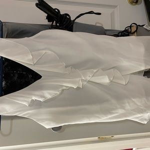 Maurices size medium white ruffle sleeveless blouse.